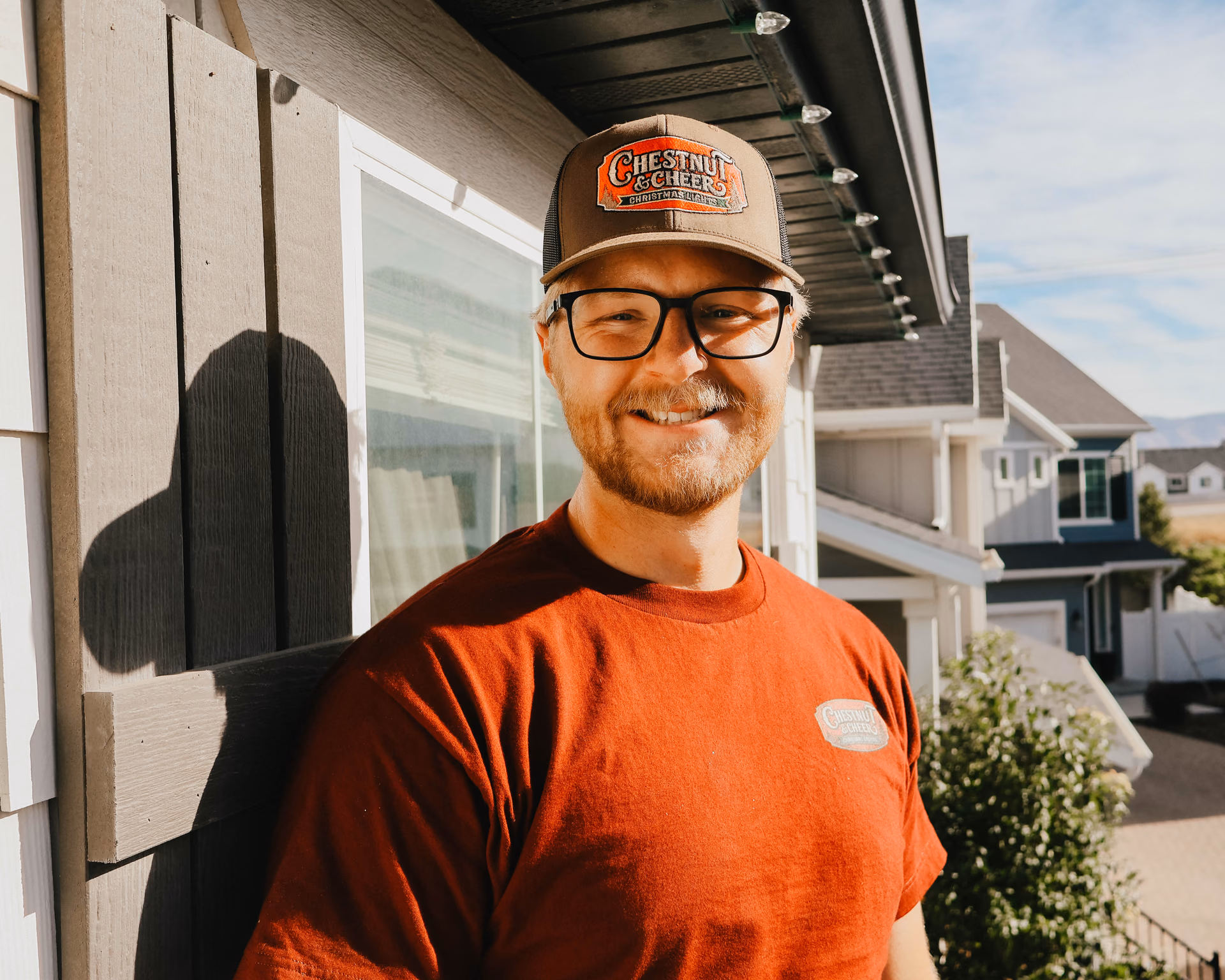 Chestnut & Cheer lighting technician at a Utah Christmas light installation