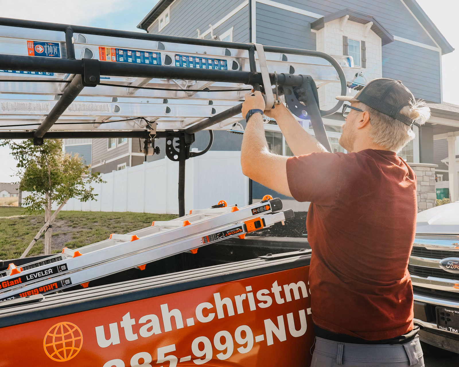 Chestnut & Cheer technician preparing equipment after seasonal installation work